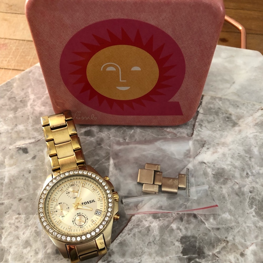 Women’s gold fossil watch